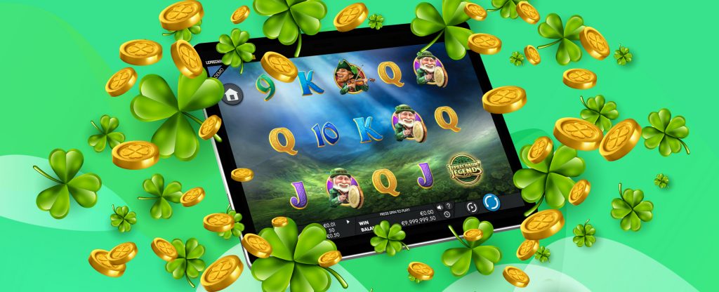 Sebuah iPad menunjukkan tangkapan layar dari fitur slot di game slot SlotsLV, Leprechaun Legends, dikelilingi oleh koin emas dan semanggi berdaun empat, dengan latar belakang abstrak hijau.