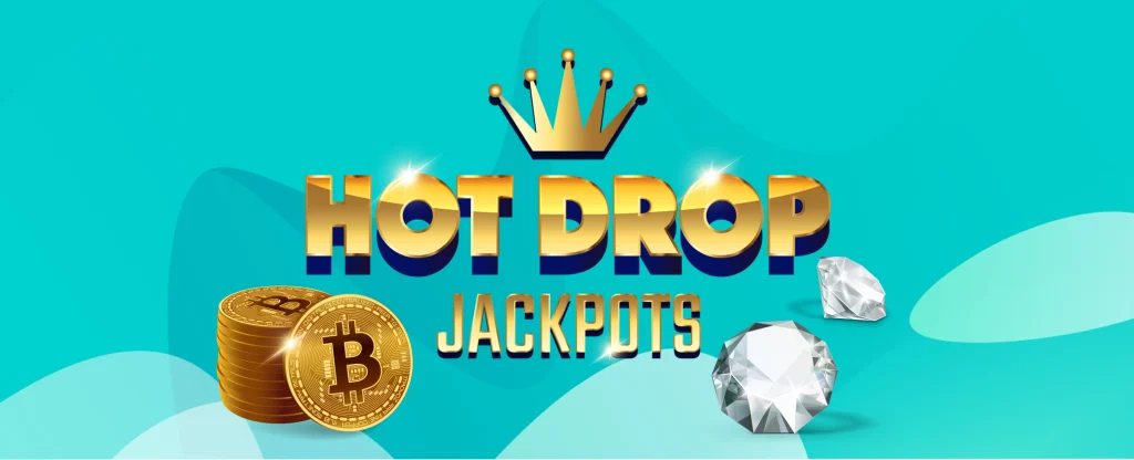 The 3D-animated ‘Hot Drop Jackpots’ logo from SlotsLV appears in the middle, flanked by bitcoins on one side and diamonds on the other, offset by a teal background.