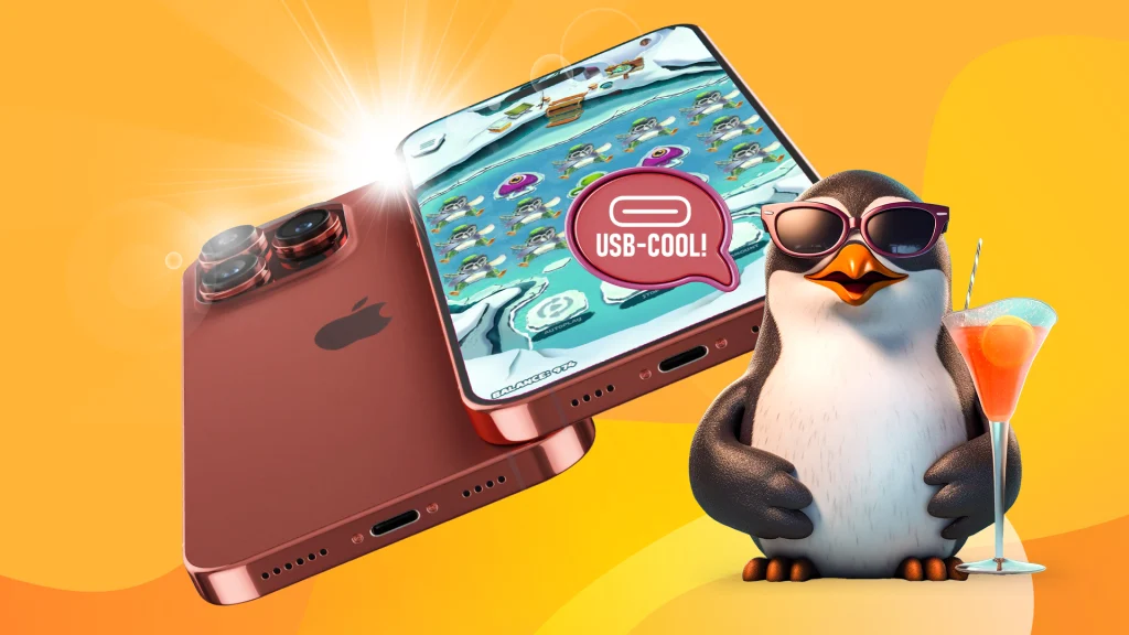 A penguin stands in front of the new iPhone 15, set against an orange and yellow background.