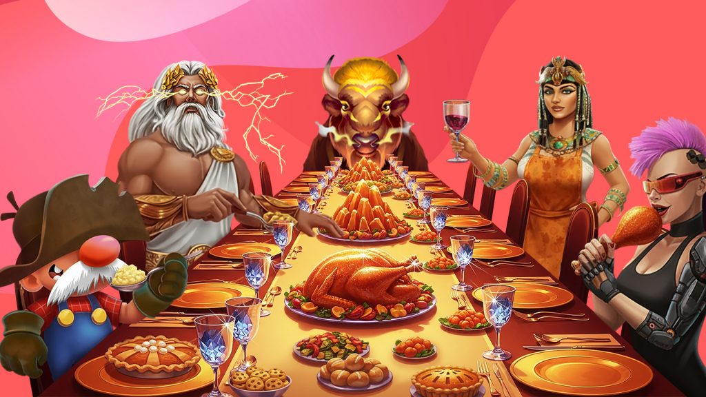 Gus, Zeus, Buffalo, Cleo, and Cyberpunk sit at a long Thanksgiving table full of food on a pink background.