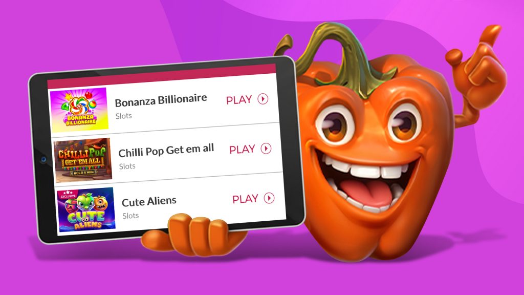 An orange bell pepper on a purple background holds a tablet showing three cascading reel slot games at SlotsLV Casino.