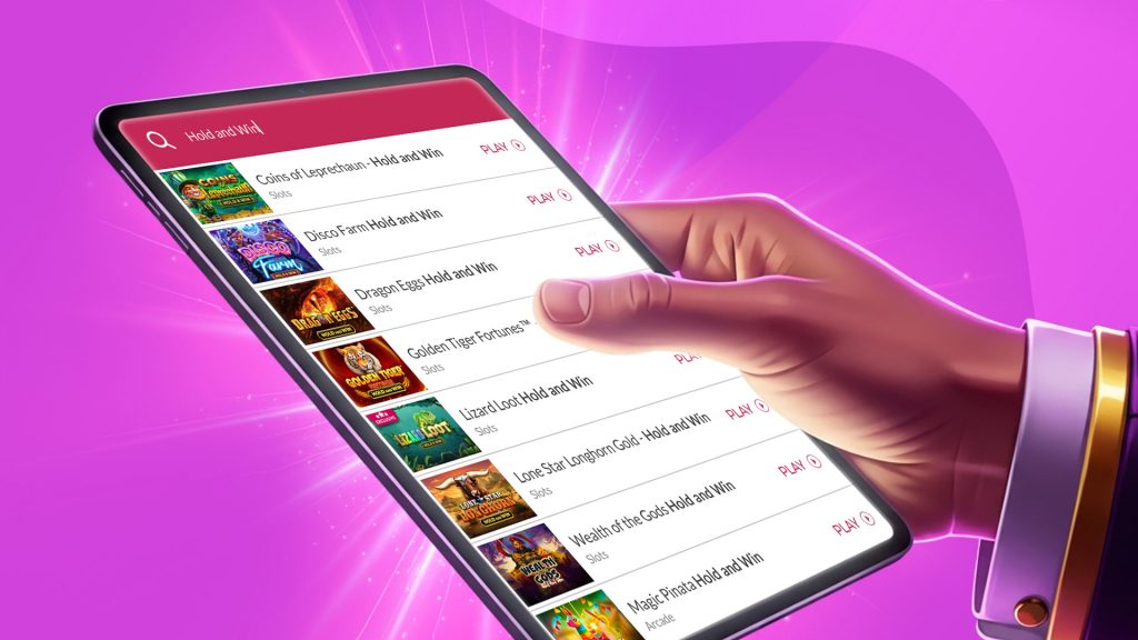 A hand holds a tablet showing the games available at SlotsLV Casino, on a purple background.